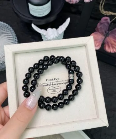 Double - loop obsidian bracelet